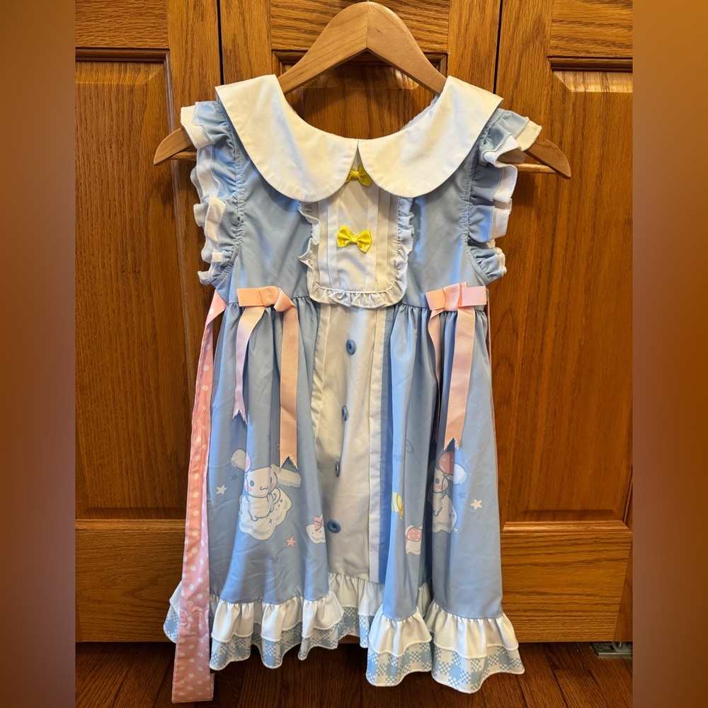 Blue and Pink Ruffled Dress with Bow Accents